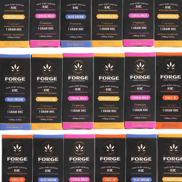 Multiple boxes of Forge Hemp Company products with different flavors and colors.